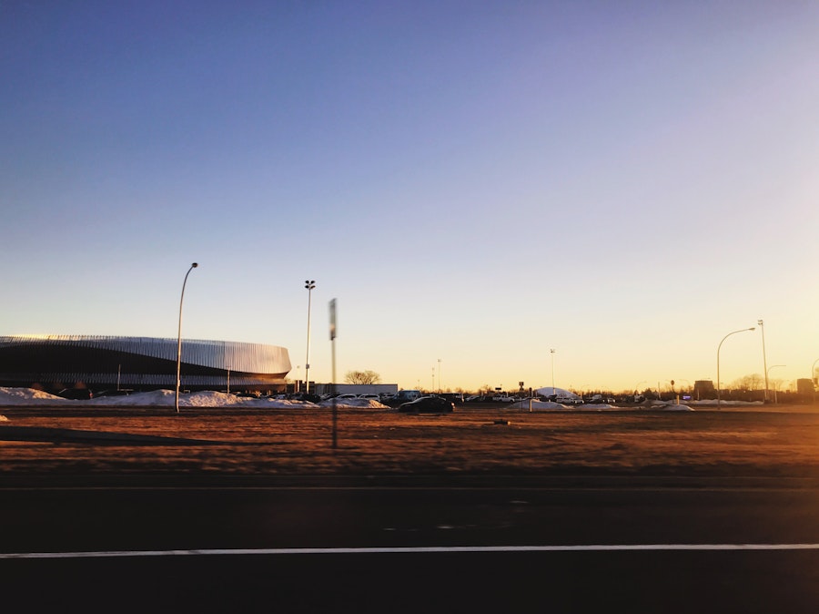 Photo: Sunset Over Cars and Buildings