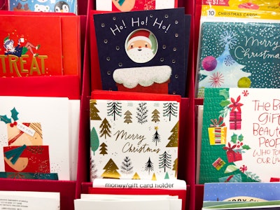 Holiday Cards in a Store - A group of Christmas cards in a rack