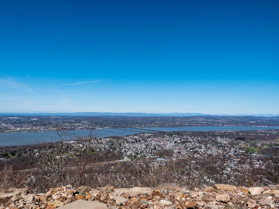 Photo: A city and large body of water from a mountain