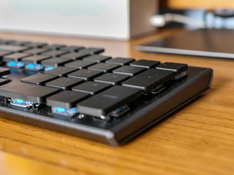 Photo: A keyboard on a wooden desk