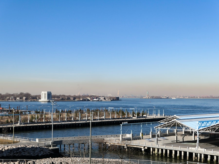 Photo: A dock with a pier and a body of water