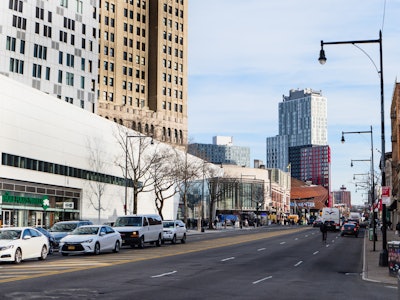 City Street and Buildings - A city street with cars and buildings