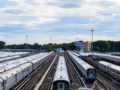 Subway Trains - A group of subway trains on tracks at a yard