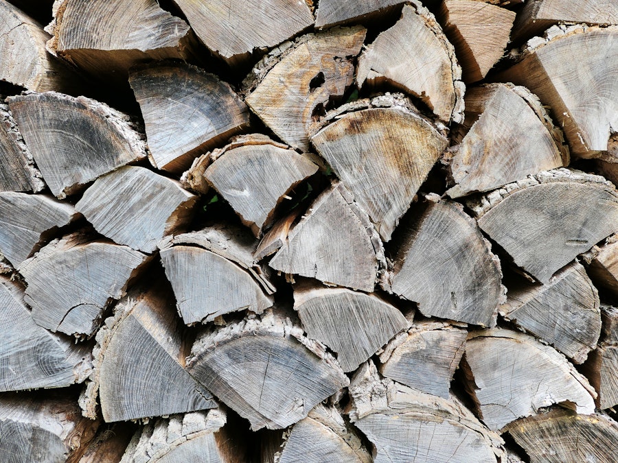 Photo: A close up of a pile of cut wood