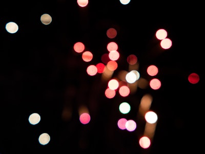 Red and White Fireworks - A blurry image of fireworks