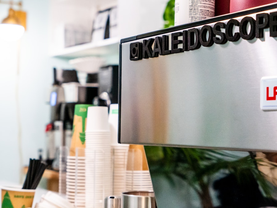 Photo: A close up of a coffee and espresso machine at a coffee shop