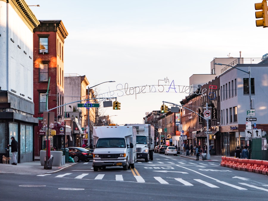 Photo: A city street with cars and buildings