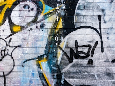 Street Art on Wall - A wall with graffiti on it