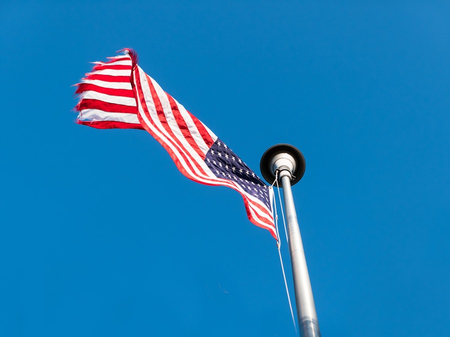 Photo: A United States of America flag flying from a pole