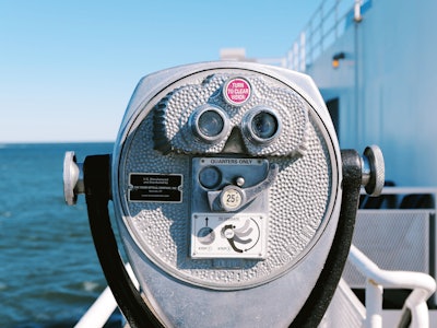 Coin Operated Binoculars - Coin operated binoculars on a boat