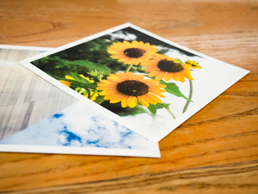 Photo: Photo Prints on Desk