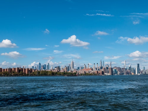 Manhattan Skyline Behind River