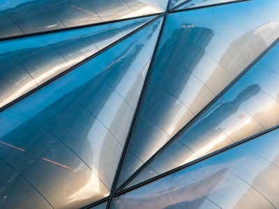 Exterior of Building - A close up of a metal blue and teal structure