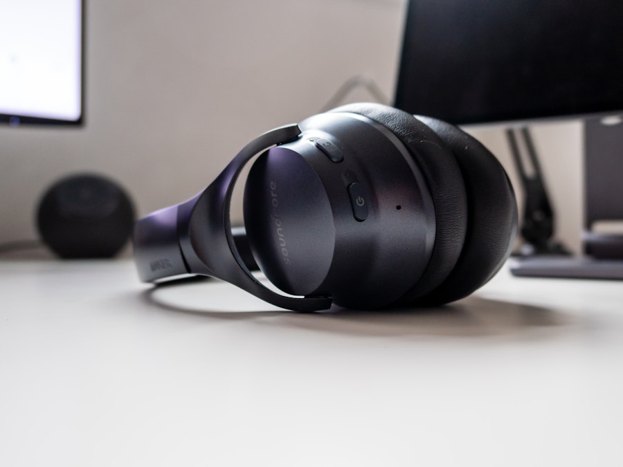 Photo: Black headphones on a white desk