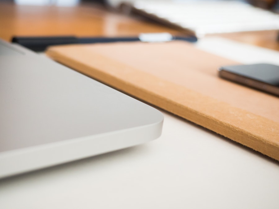 Photo: Desk with Sketchbook and Laptop