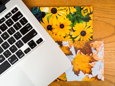 Photo Prints Under Laptop