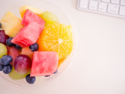 Fruit in Cup on Desk