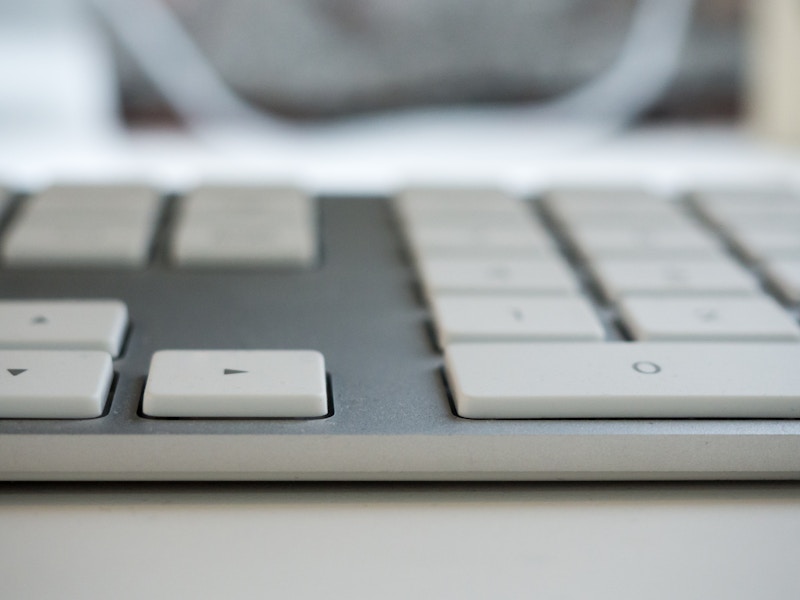 Photo: Keyboard on White Desk