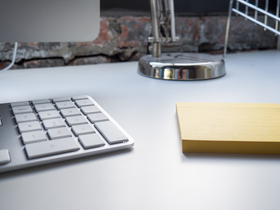 Photo: Office Desk with Keyboard and Notepad