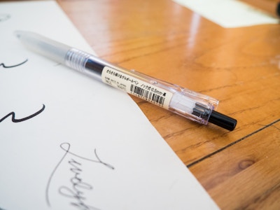 Pen and Paper on Desk