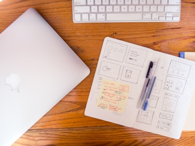 Desk with Notebook and Laptop from Overhead