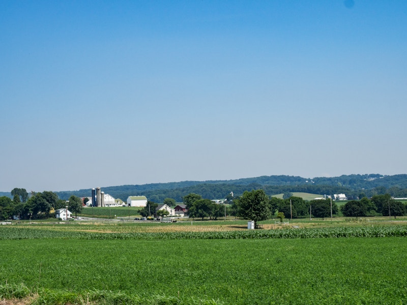 Photo: Farm Under Blue Sky