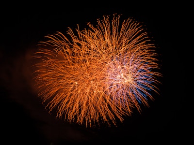 Red and Blue Fireworks - Red and blue fireworks in the night sky