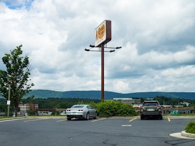 Parking Lot Overlooking Highway and Mountains