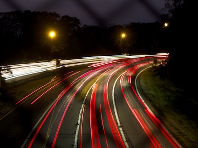 Long Exposure Cars on Highway - Long exposure car lights on a parkway at night