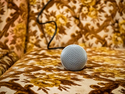Microphone on Couch - A close up of a microphone on a couch