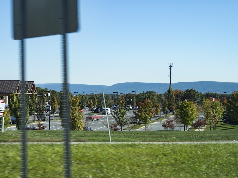 Photo: Store Parking Lot with Mountains