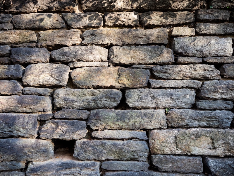 Photo: A close up of a stone wall texture