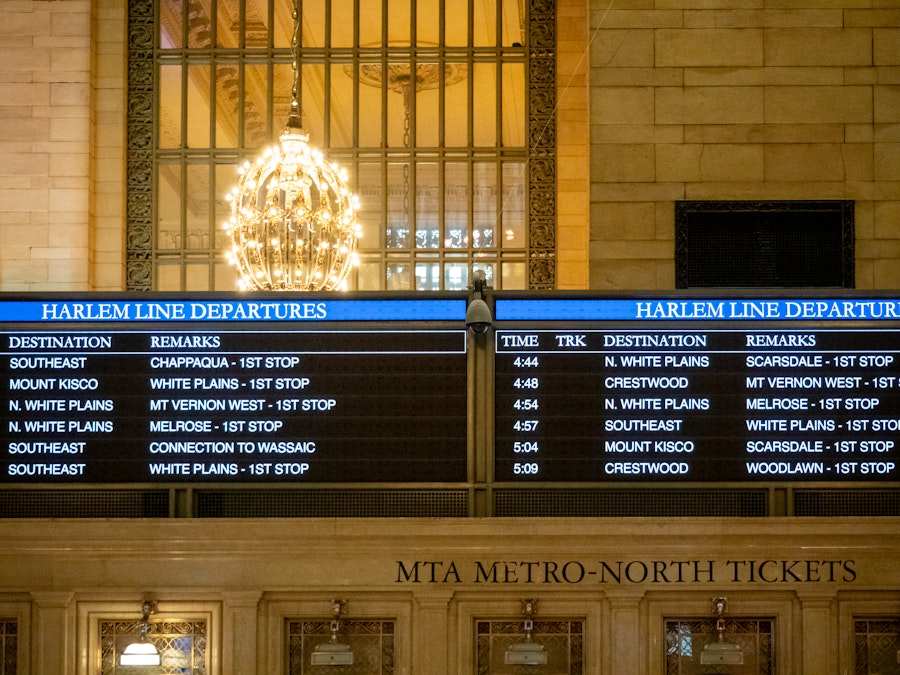 Photo: A sign with a list of train departures in Grand Central Terminal