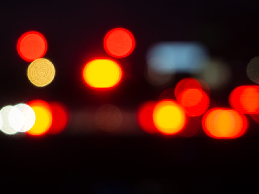Photo: A blurry image of red and yellow lights in motion 