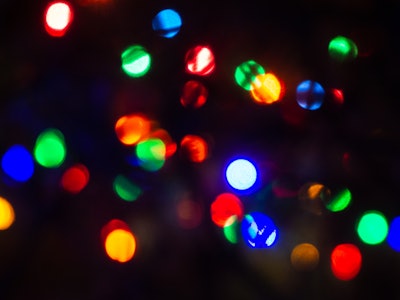 Blurred Lights - A blurry image of colorful lights on a Christmas tree 