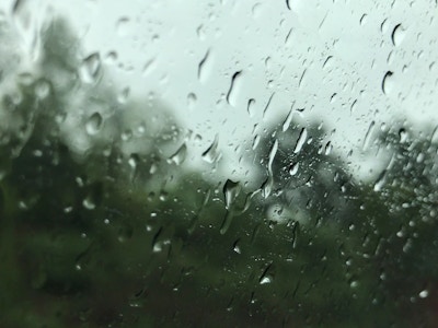 Raindrops Falling on Moving Car Window